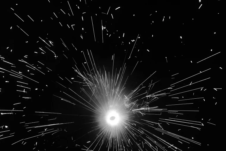 a black and white pograph of a star burst