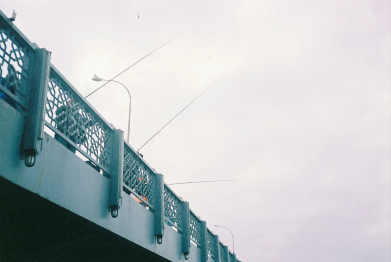 an object is flying over a bridge