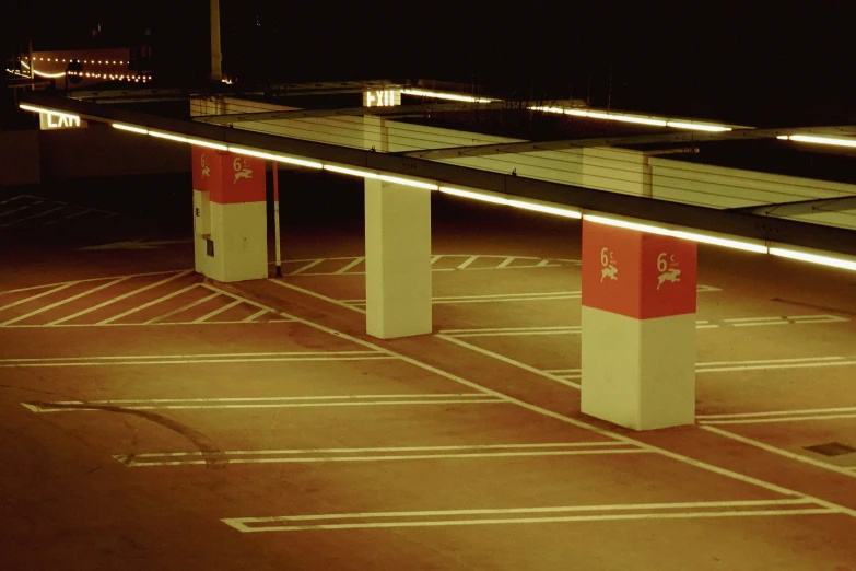 there are two parking spots with benches underneath