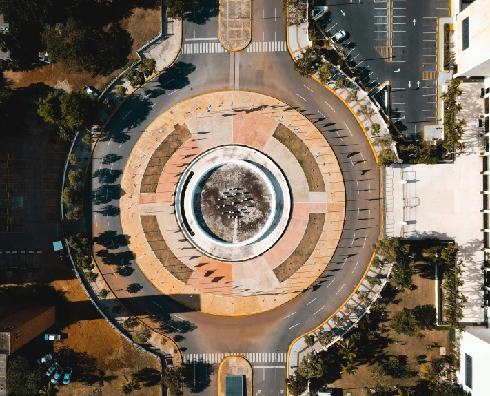 the circular building has trees in it