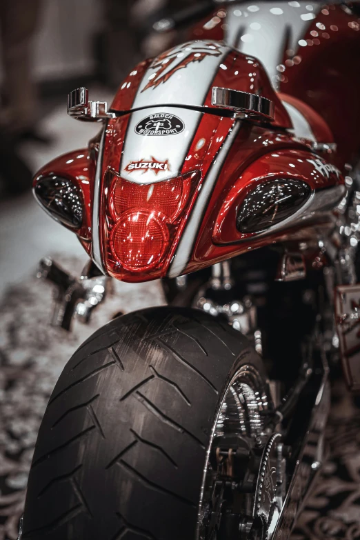 the back end of a motorcycle parked on the ground