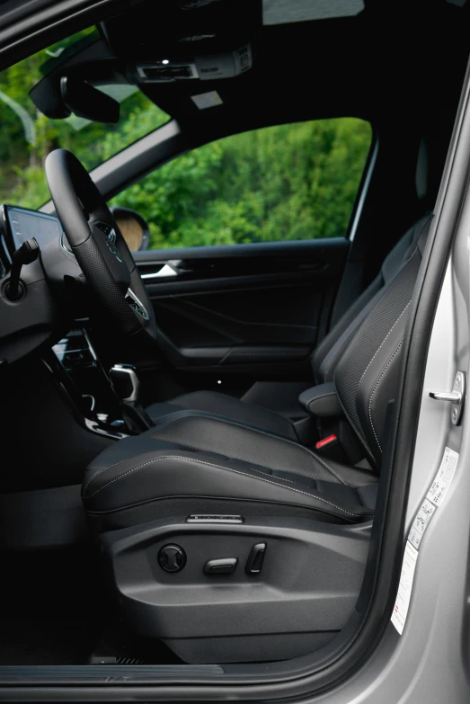 a view of the dashboard and steering wheel of a vehicle