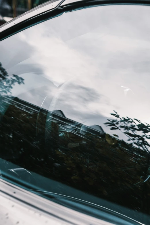 a street scene with focus on a car