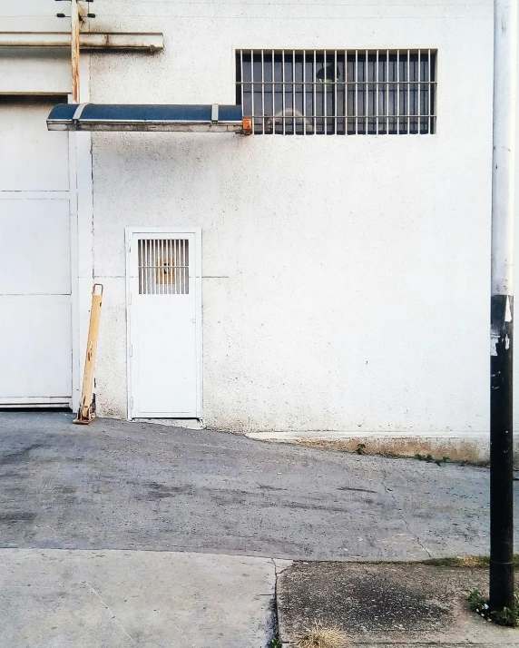 the outside of an office building with a gate