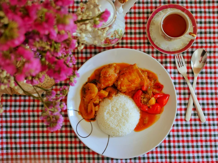 a meal that includes rice, and meat