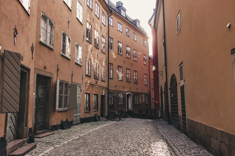 street scene in an old city with many windows