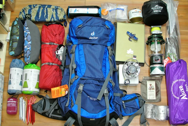 an array of luggage items laid out on the floor