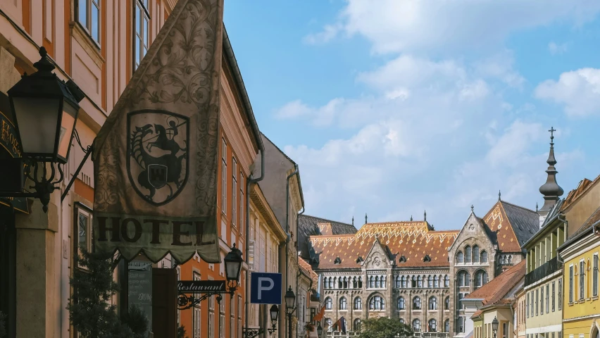 street scene of buildings and a blue sign