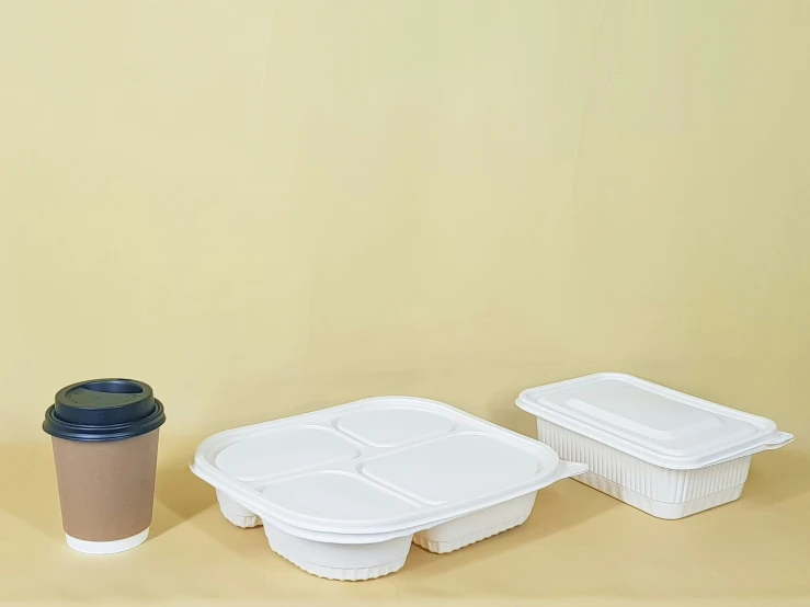 a picture of three plastic containers and two cups