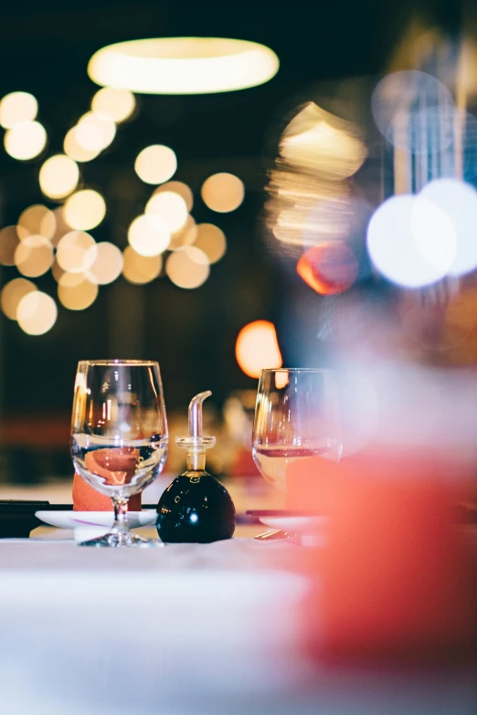 a group of wine glasses that are on a table