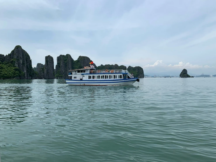 a boat that is sitting in the middle of the water