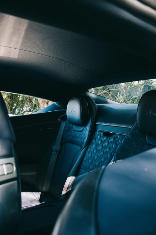 a view from the back seat of a car