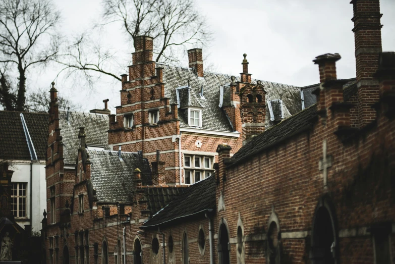 the top half of old brick buildings in the city