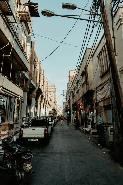 a small narrow street with several buildings