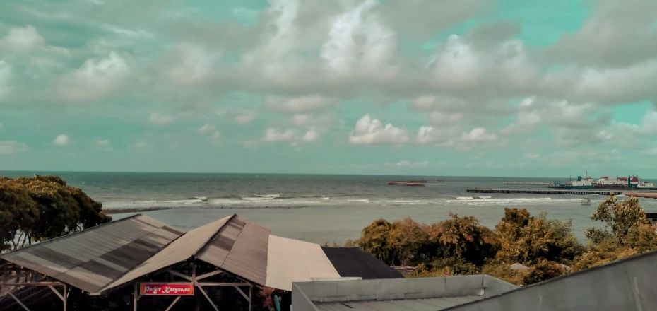 the view from a roof overlooking a body of water