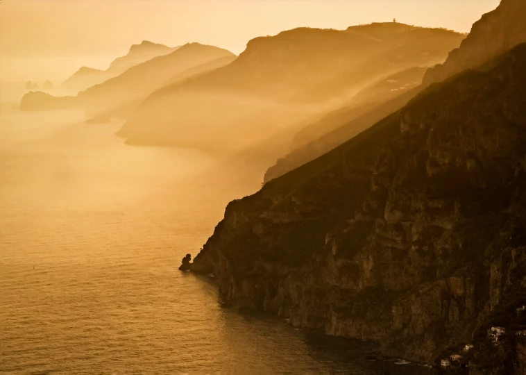 the view from a cliff in the middle of water