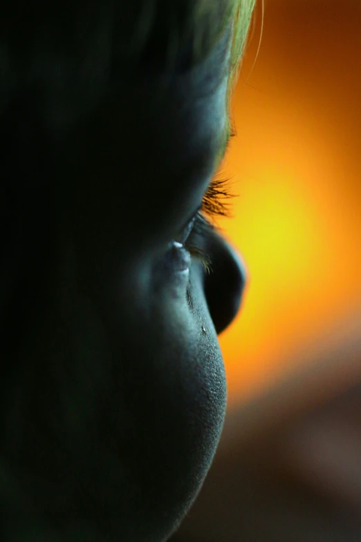 an up close view of a boy's face and nose