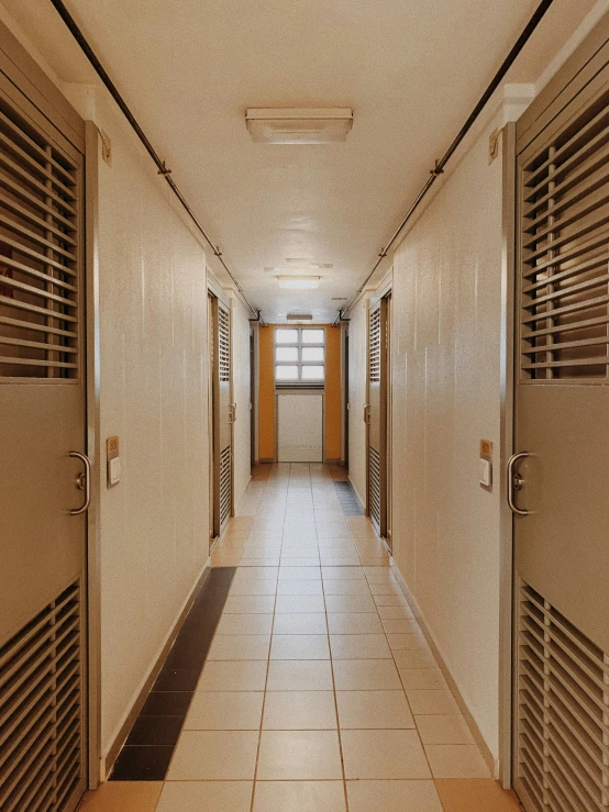 a po of a corridor with many closed doors