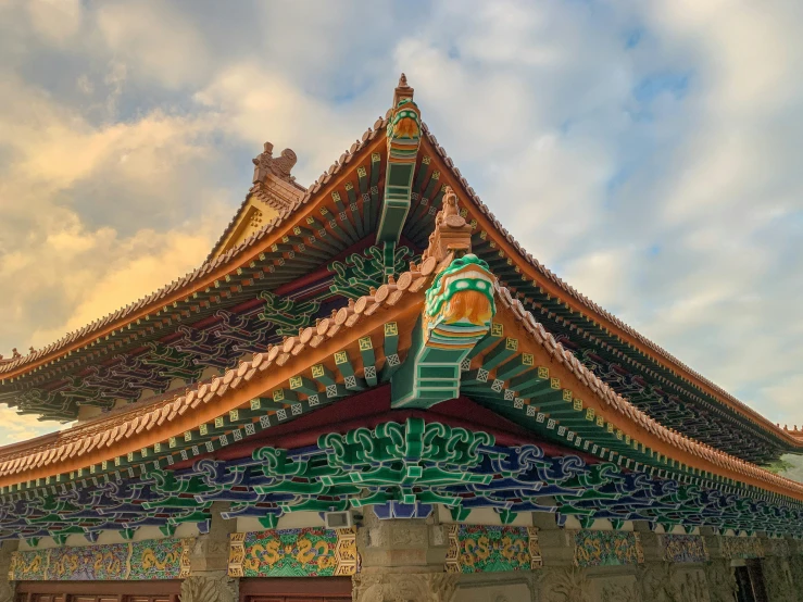 an ornate building is painted with oriental designs