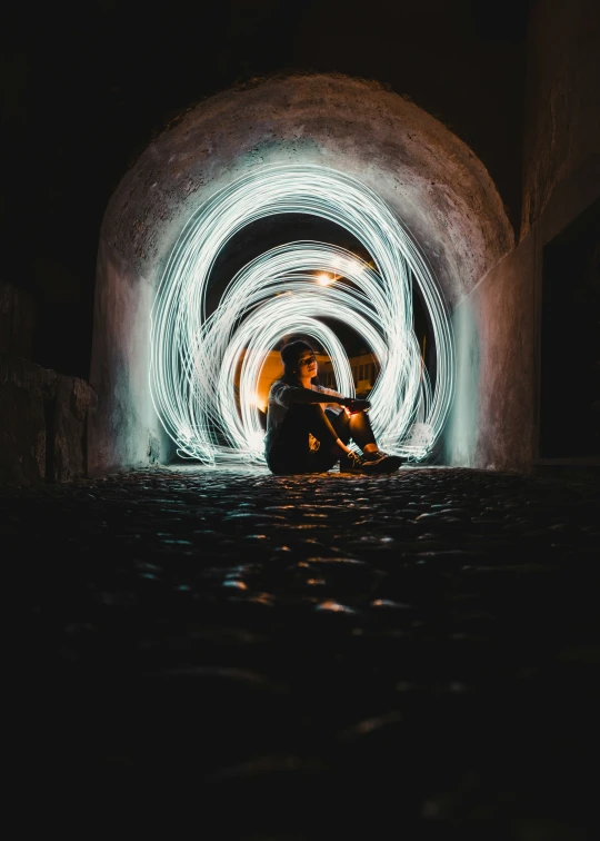 an image of people sitting in the tunnel