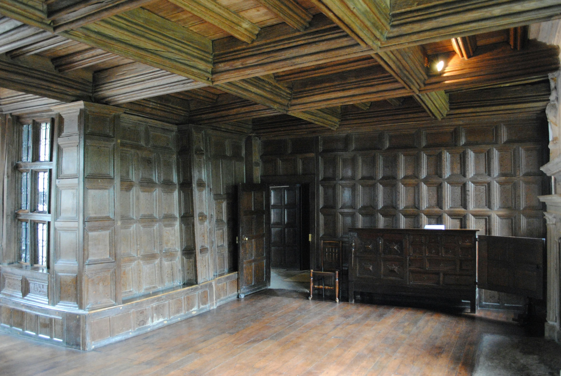 this is a beautiful rustic bedroom with a vaulted ceiling