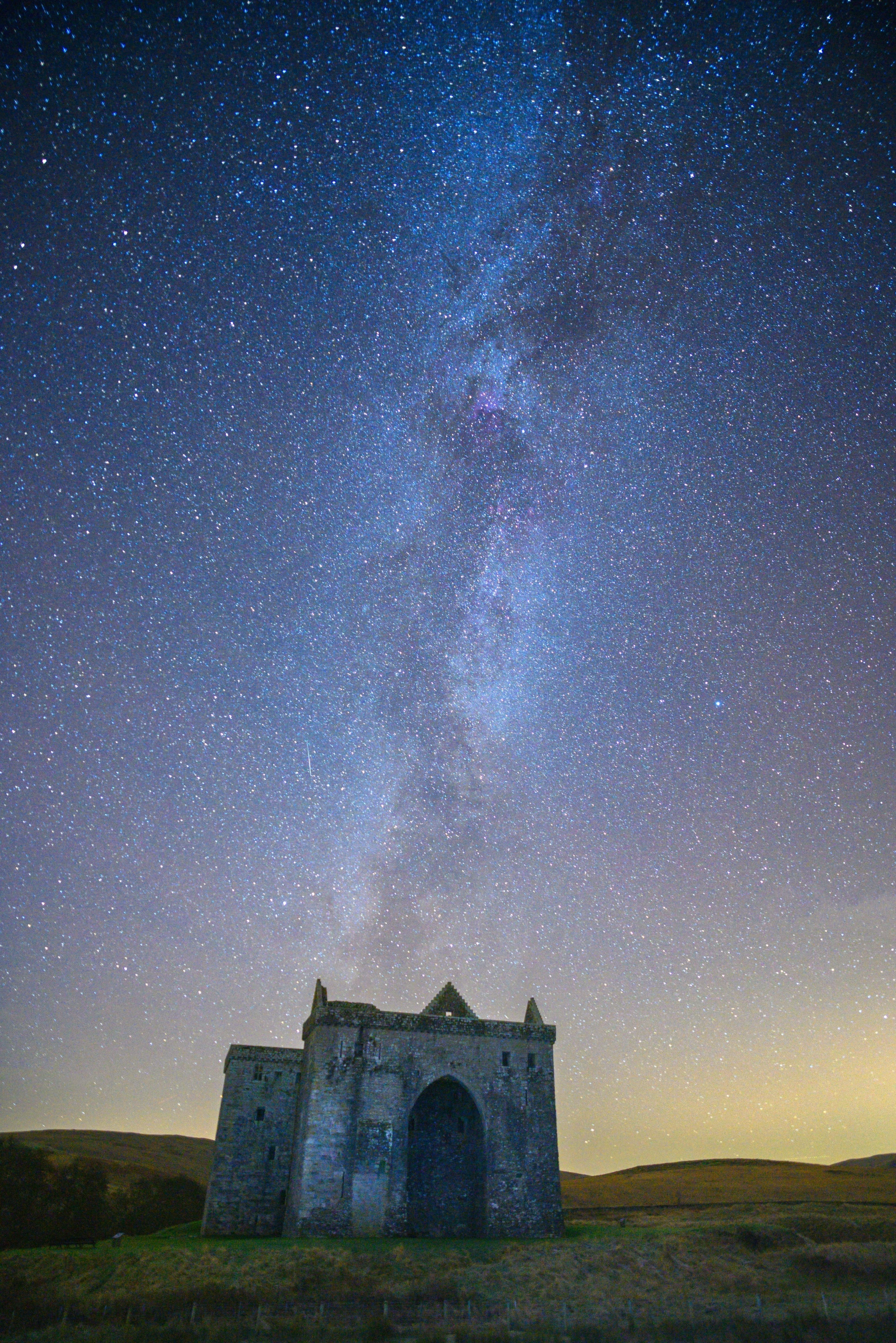 a church with a building that looks like a cave