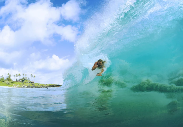 a surfer on a surfboard riding a wave