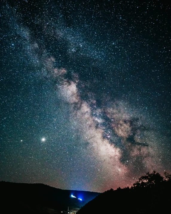 the night sky with bright stars and planets