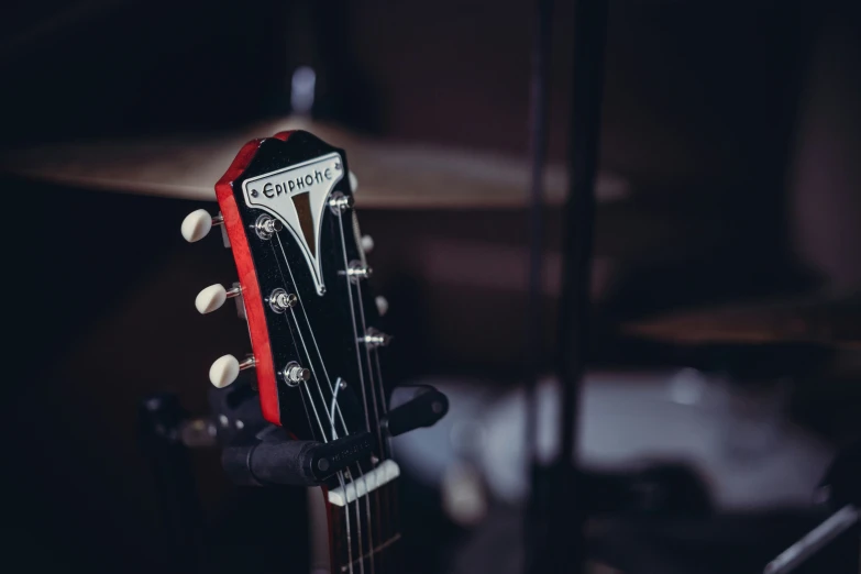 a close up view of the head and neck of a guitar