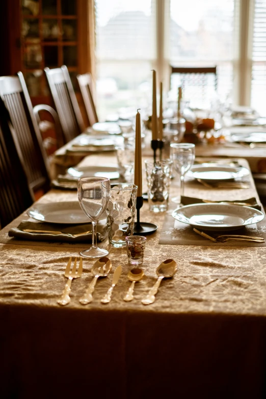 this is an image of a dining table set for dinner