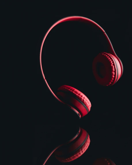 there are two red headphones with the tops out