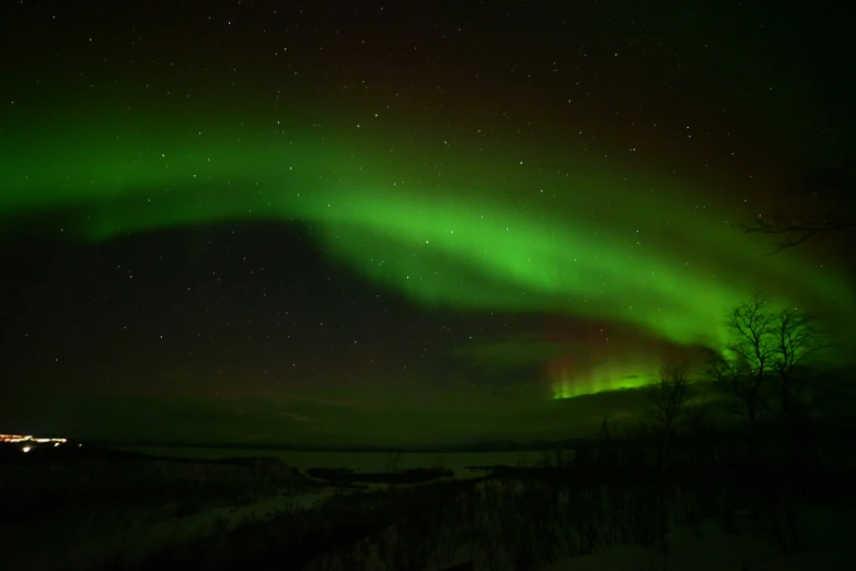 an aurora bore is pictured against the night sky