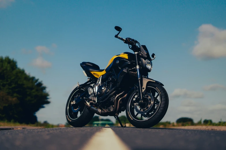 a motorcycle parked on the side of the road