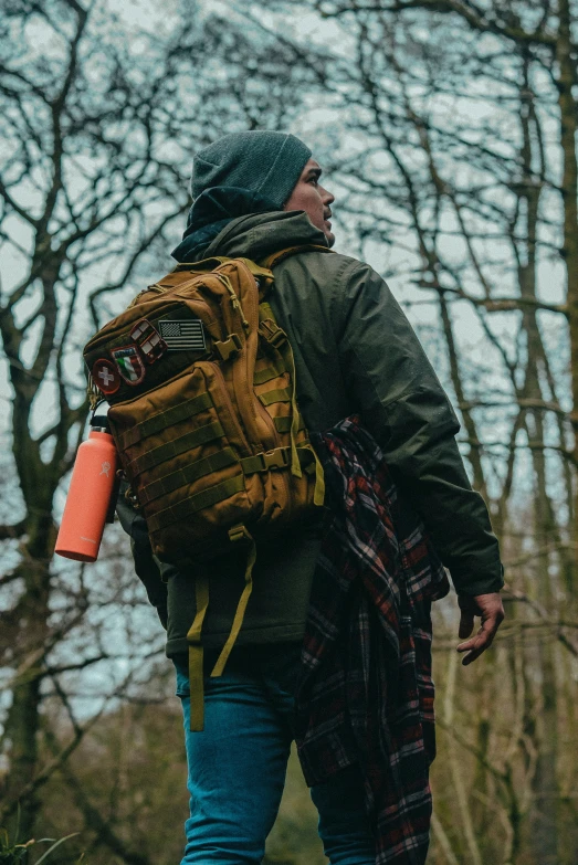 a person with a backpack walking down the street