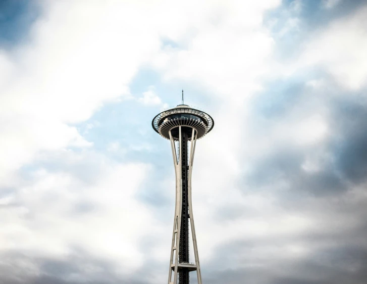 a building that looks like it is standing high in the sky