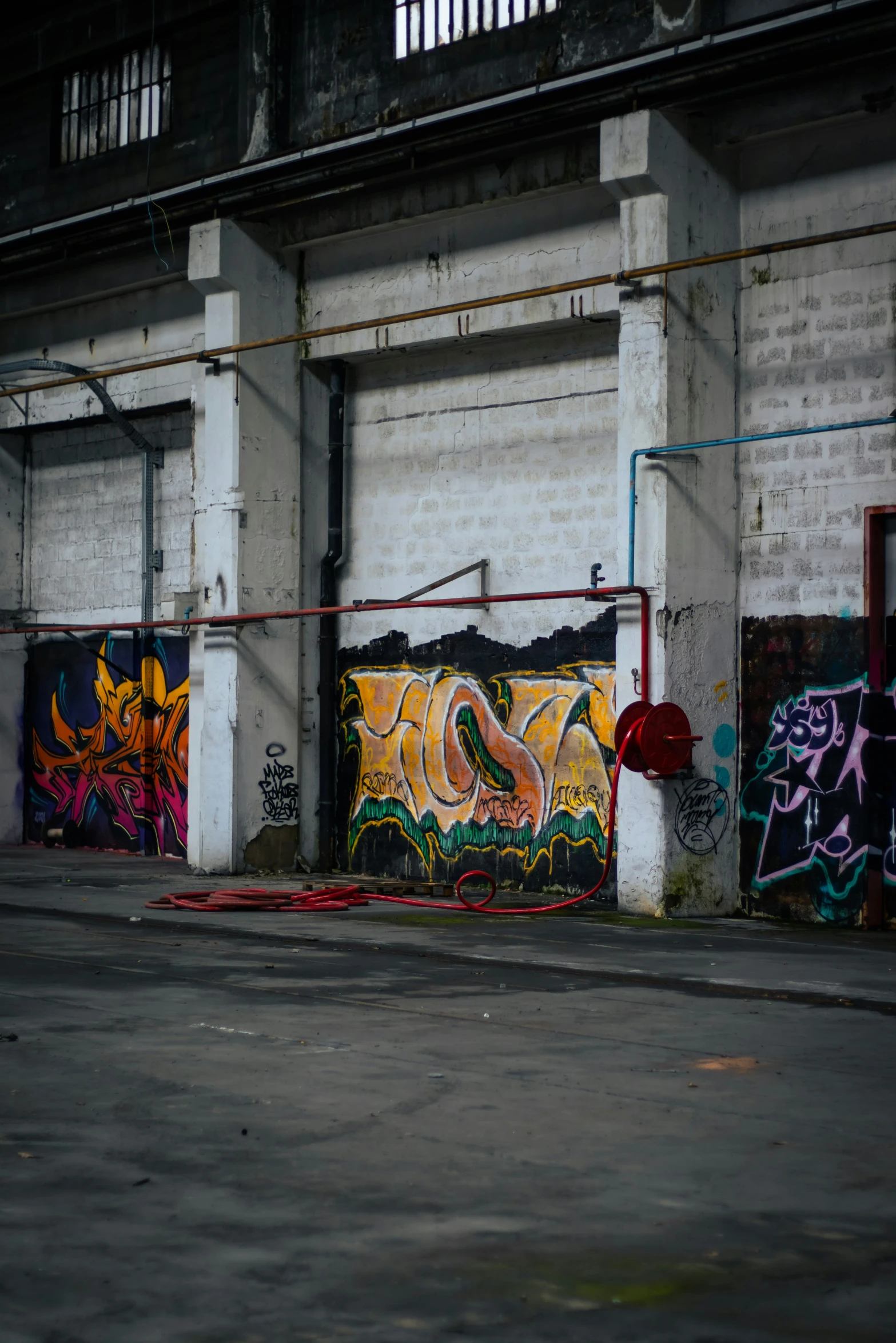 a white building with lots of graffiti on it