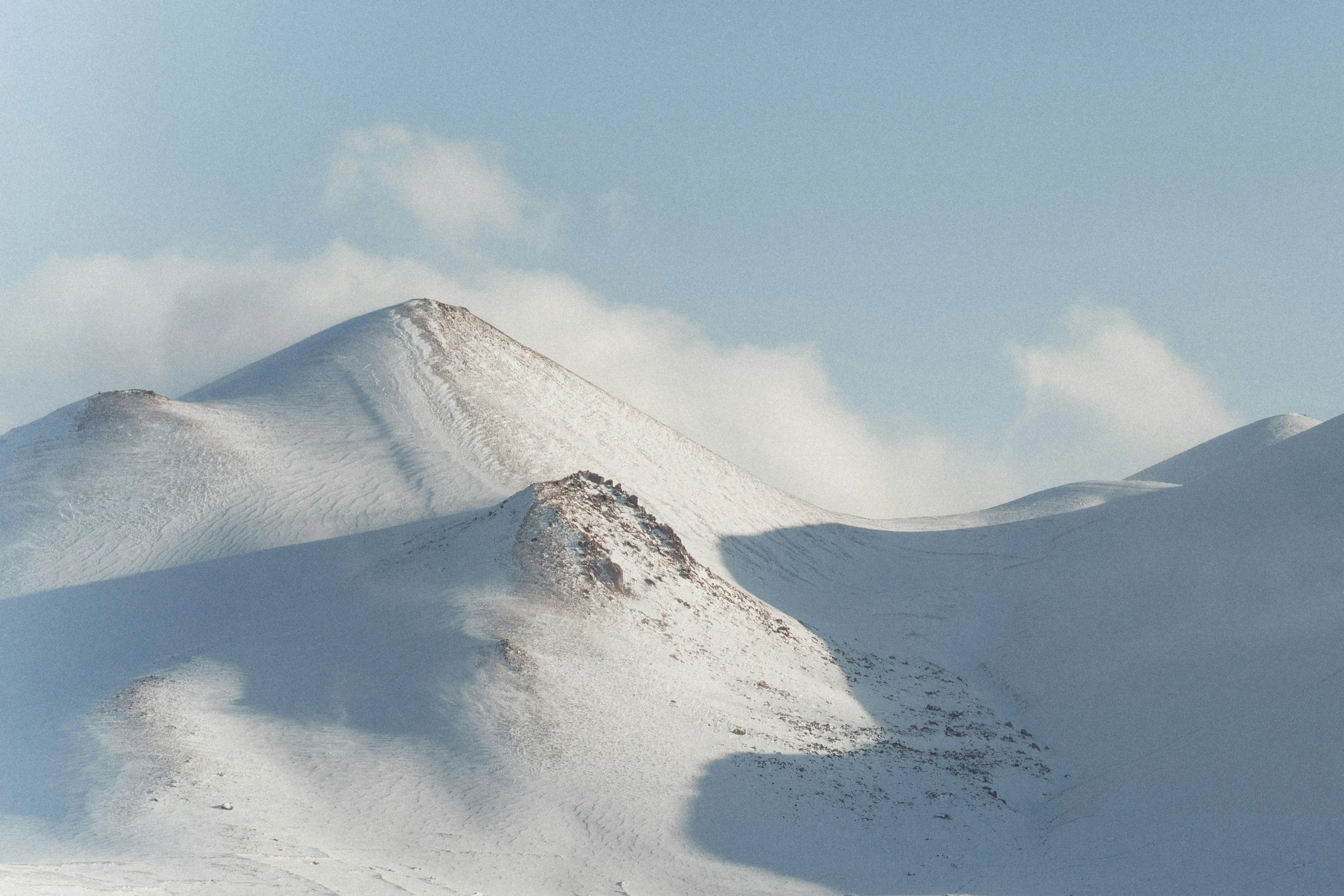 this is a snowy mountain in the mountains