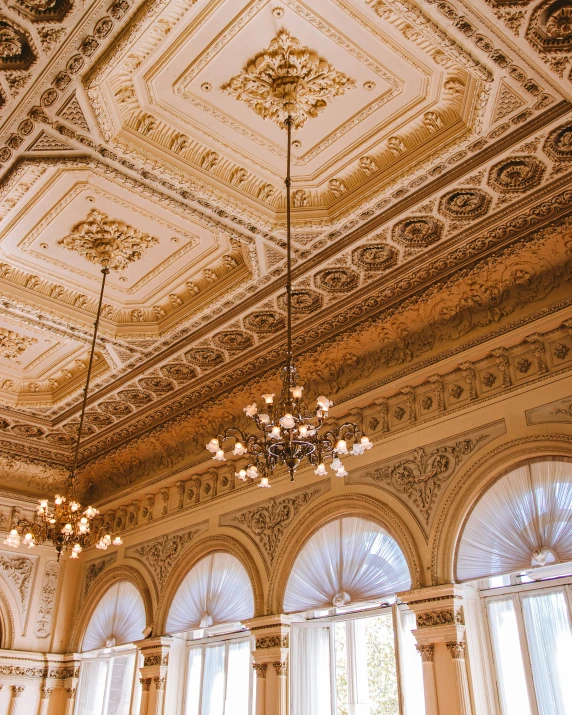 beautiful chandeliers and chandelier in ornate white and gold paint