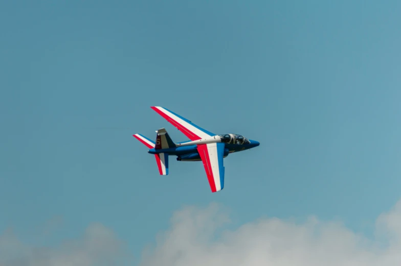 a small passenger plane is flying through the sky