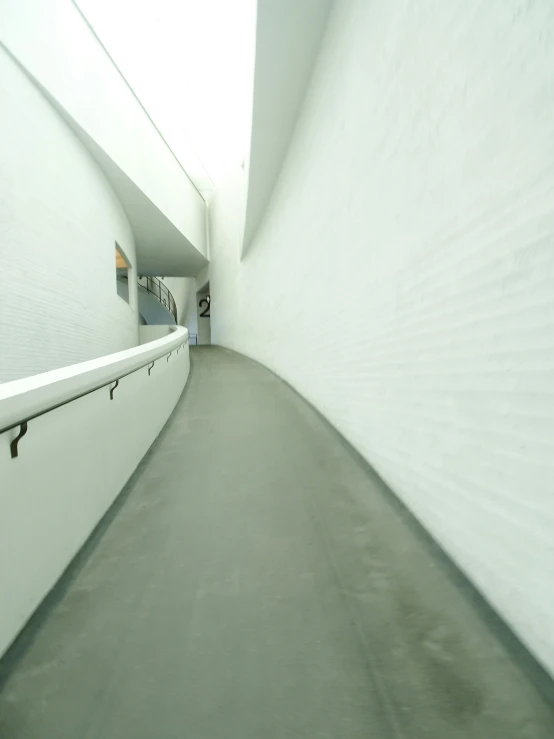 an image of a curved white room