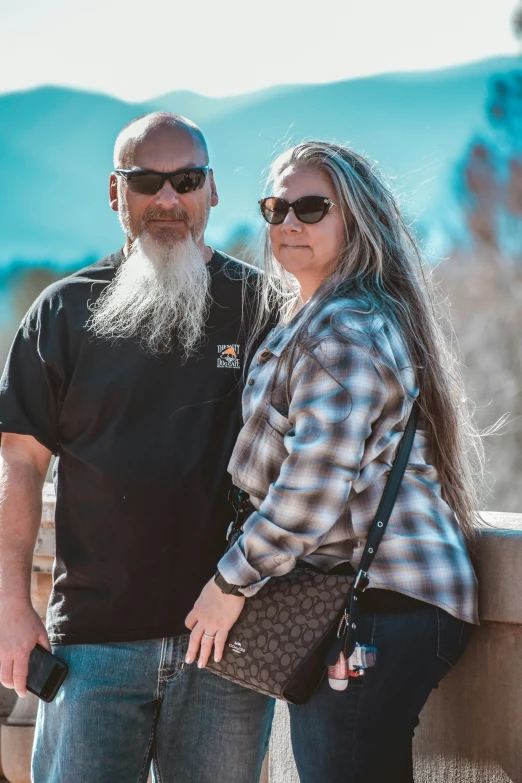 a woman and a man posing for a po