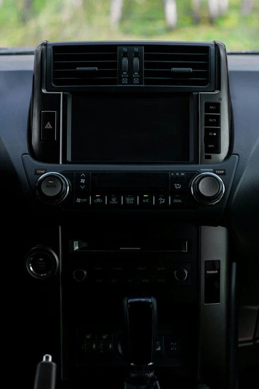 the dash panel on a vehicle with electronics and controls