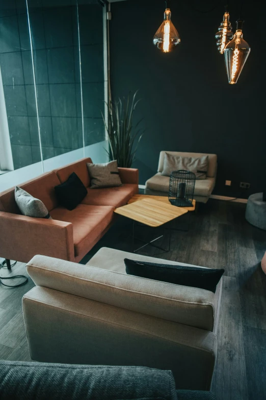 a living room with several different couches in it