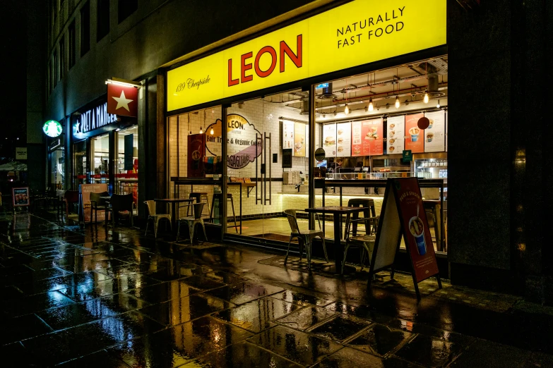 the restaurant has the name leon on the outside