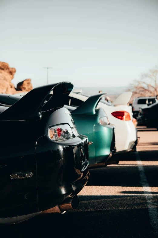 a bunch of cars parked next to each other