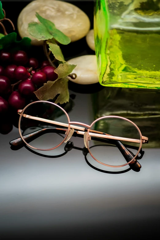 some fruit and glasses with some brown things on the table