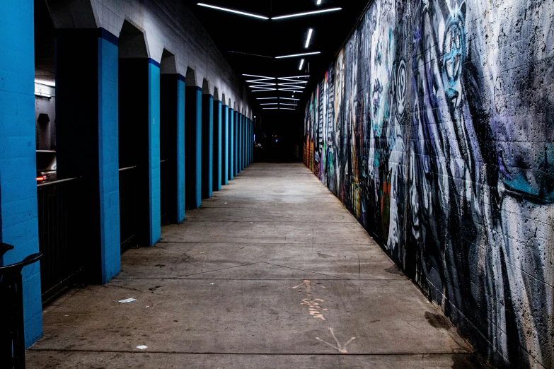 a hallway with painted walls and many doors