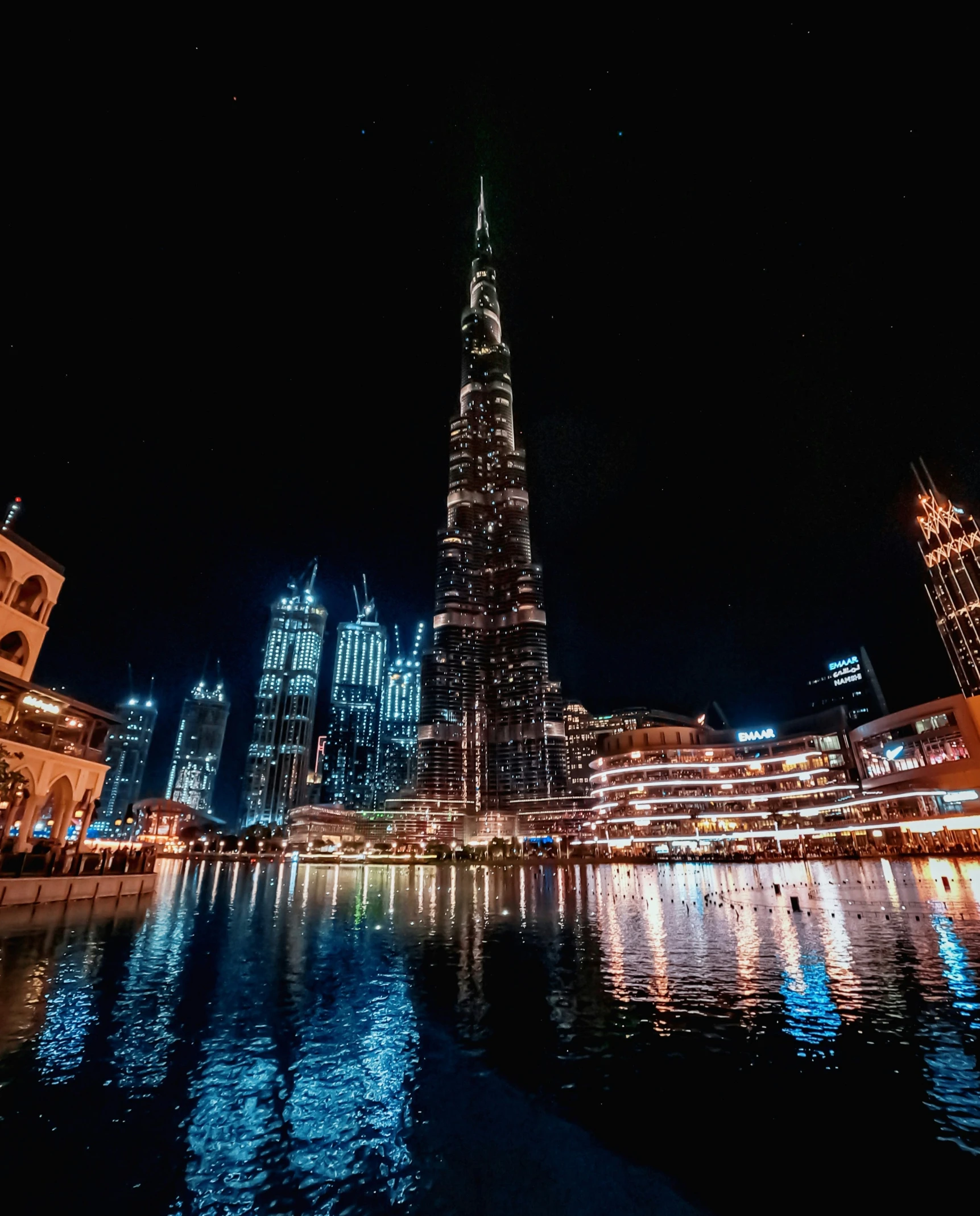 a dark view of a very tall building