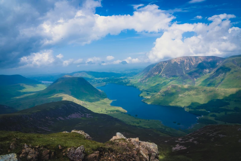 a view of some mountains near a river