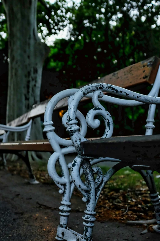 a close up image of some benches behind it